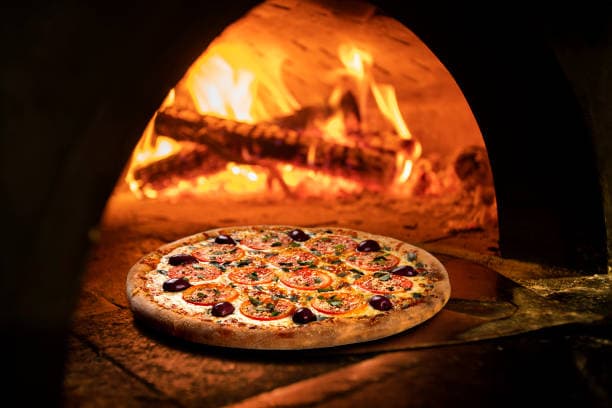 Nosso forno a lenha artesanal